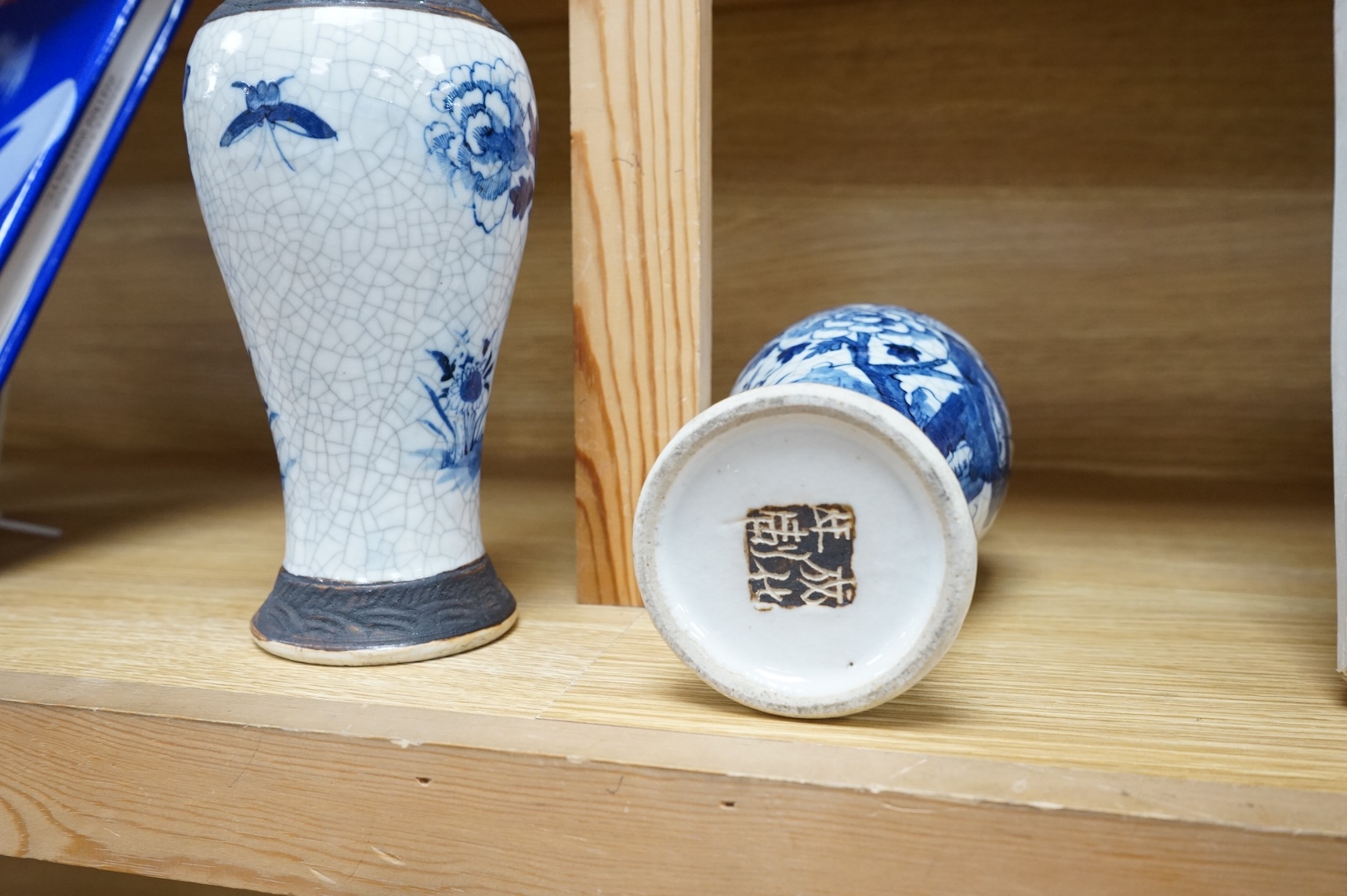 A pair of Chinese blue and white crackleware baluster vases, early 20th century, 26cm high